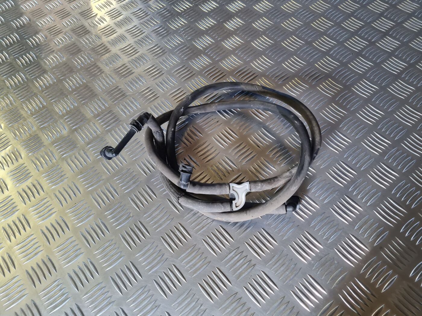 Lukturu mazgātāja sprauslas šļūtene priekš VW GOLF 5 2004 1 Lukturu mazgātāja sprauslas šļūtene priekš VW GOLF 5 2004