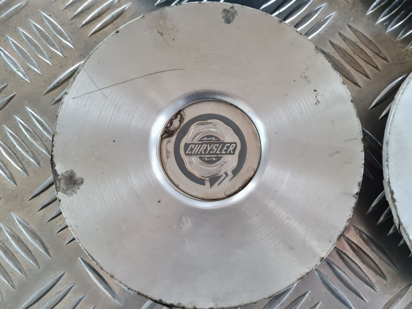 Diska kalpaks priekš CHRYSLER VOYAGER 2006 6 Diska kalpaks priekš CHRYSLER VOYAGER 2006