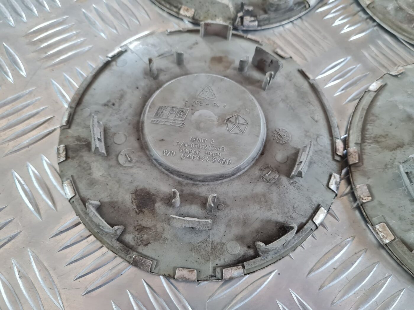 Diska kalpaks priekš CHRYSLER VOYAGER 2006 4 Diska kalpaks priekš CHRYSLER VOYAGER 2006