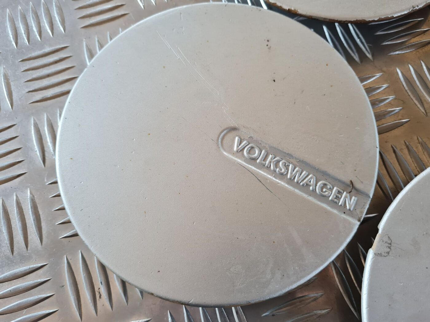 Diska kalpaks priekš VW GOLF IV 1999 7 Diska kalpaks priekš VW GOLF IV 1999