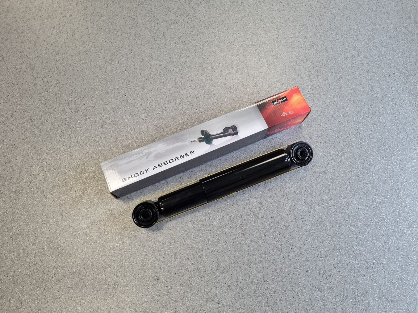 Aizmugurējais amortizators priekš 1 Aizmugurējais amortizators priekš