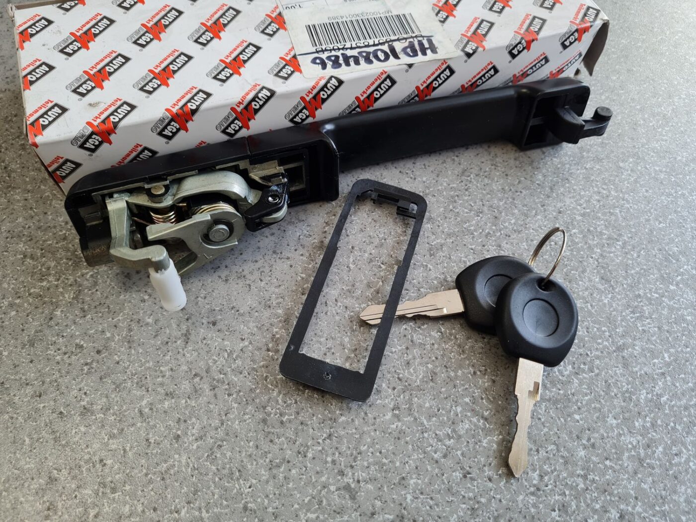 Priekšējāis kreisais durvju rokturis priekš 2 Priekšējāis kreisais durvju rokturis priekš